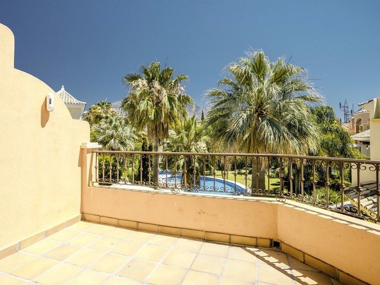 Elegant Four-Bedroom Home with Sea Views in Jardines de las Lomas 14