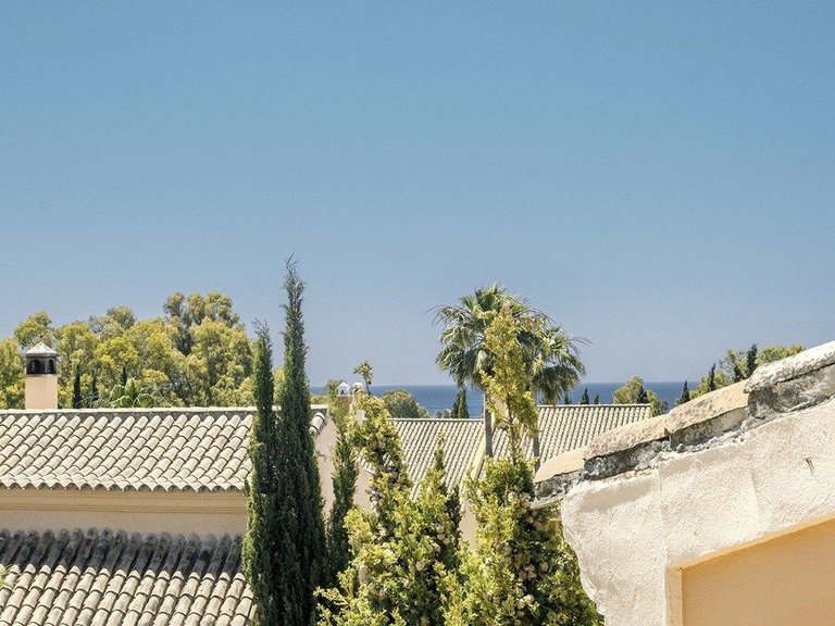 Elegant Four-Bedroom Home with Sea Views in Jardines de las Lomas 13