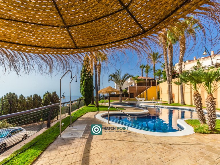 IN A RESIDENTIAL COMPLEX WITH COMMUNAL SWIMMING POOLS 60